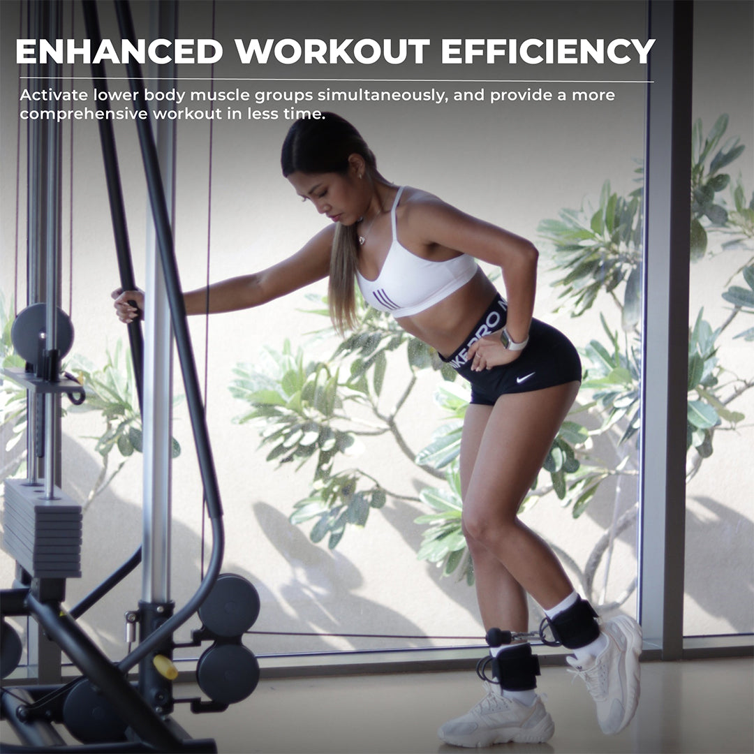 Woman performing cable kickbacks using Yaghzu ankle straps for cable machine. Ideal ankle cuffs gym accessory for activating glutes, hamstrings, and legs. Durable wrist and ankle cuffs with secure D-ring attachment, perfect for comprehensive leg workouts.