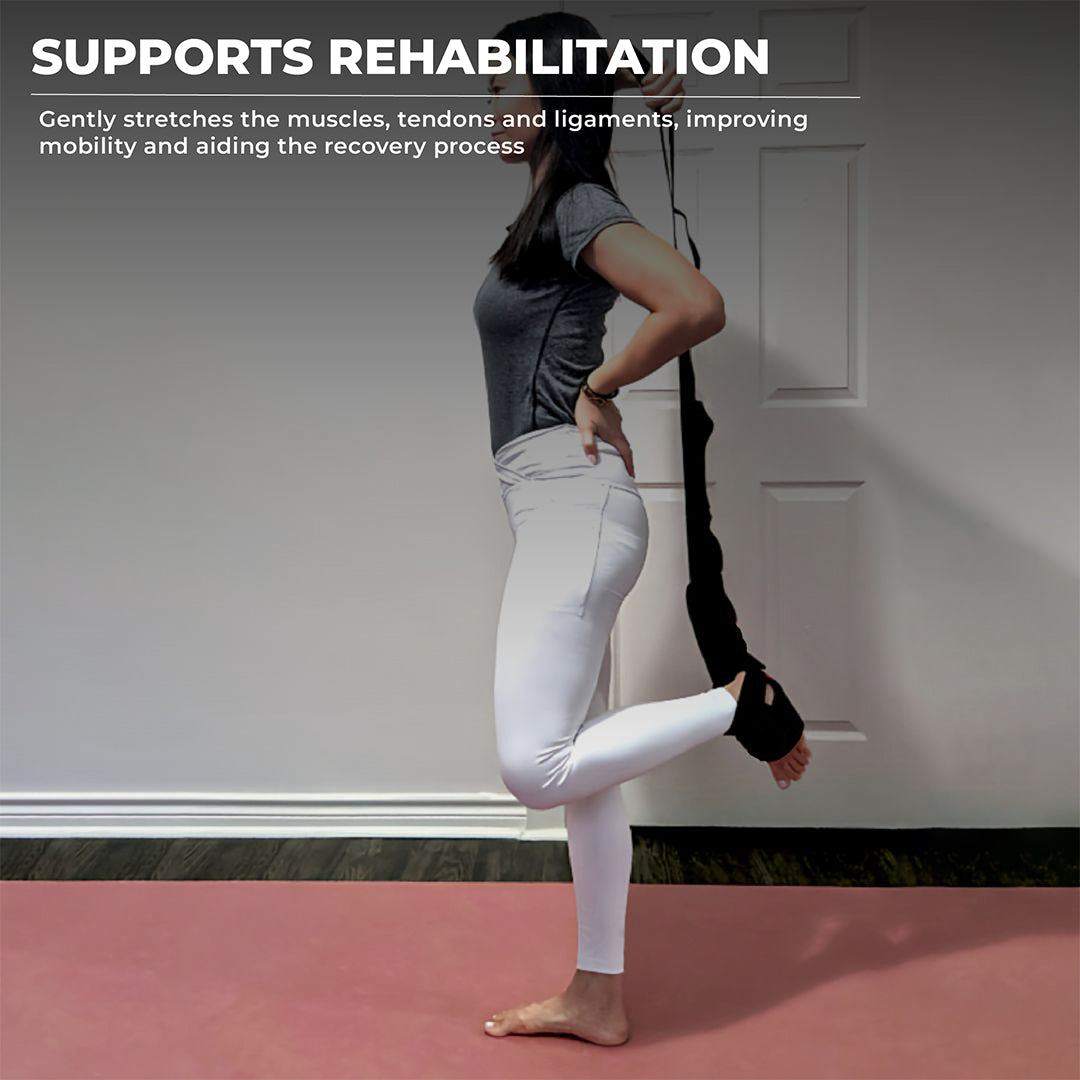 Woman using a foot and calf stretcher with yoga straps, performing a standing stretch to aid rehabilitation and mobility—ideal foot rocker for plantar fasciitis, Achilles tendonitis, and calf muscle recovery using a plantar fasciitis stretch device.