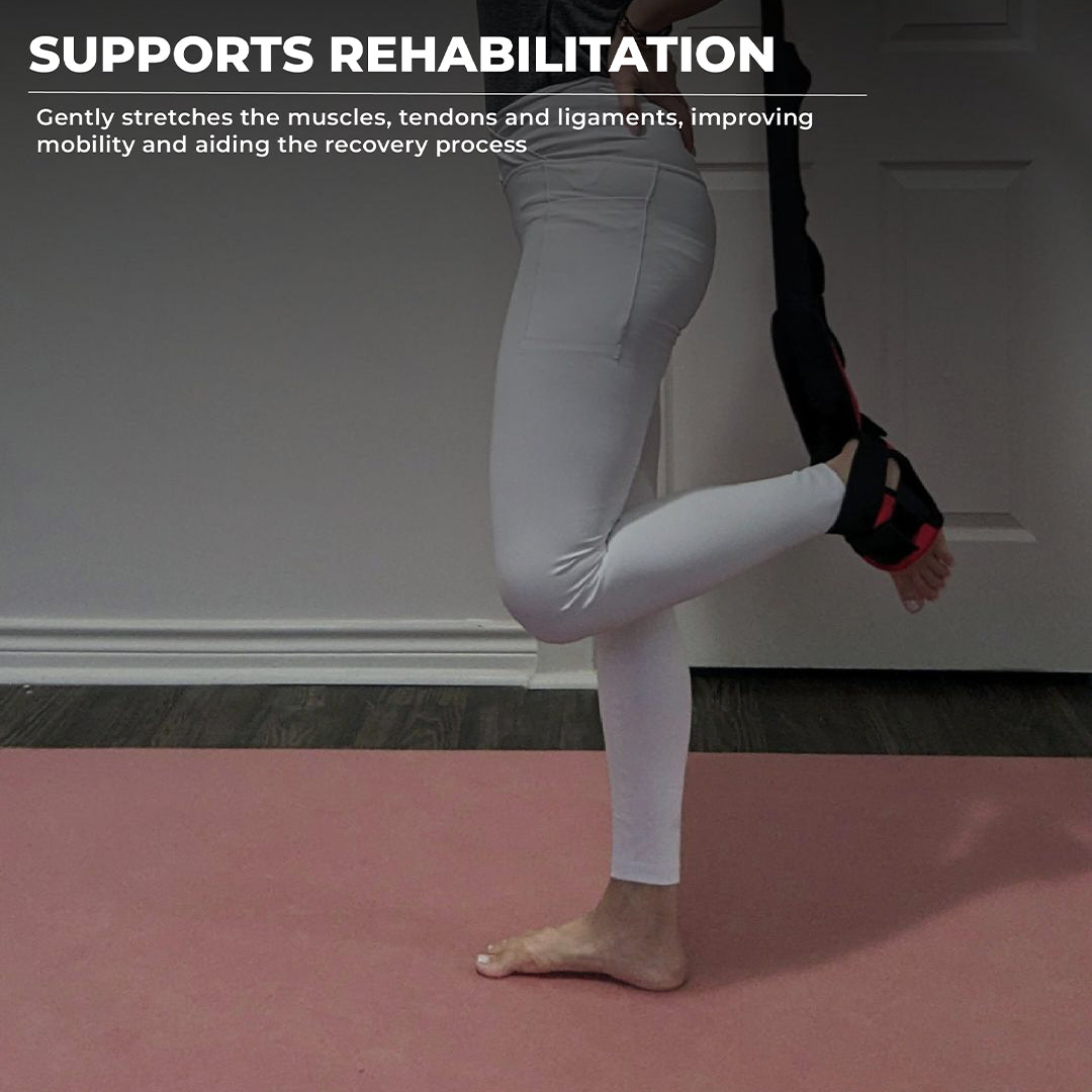 Woman using a foot and calf stretcher with yoga straps, performing a standing stretch to aid rehabilitation and mobility—ideal foot rocker for plantar fasciitis, Achilles tendonitis, and calf muscle recovery using a plantar fasciitis stretch device.