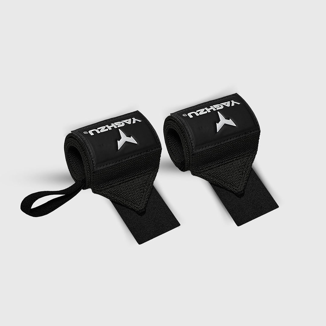 Pair of black Yaghzu wrist wraps with thumb loops, premium support gear for weightlifting, strength training, CrossFit, and powerlifting—ideal for wrist stabilization and injury prevention during heavy lifts