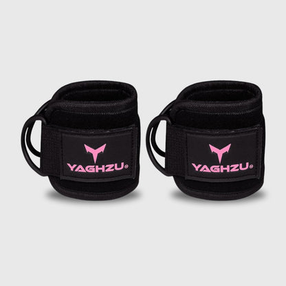 Yaghzu black and pink ankle straps pair for cable machine workouts — durable gym ankle cuffs designed as wrist and ankle cuffs, leg straps, and cable ankle straps for strength training and resistance exercises.