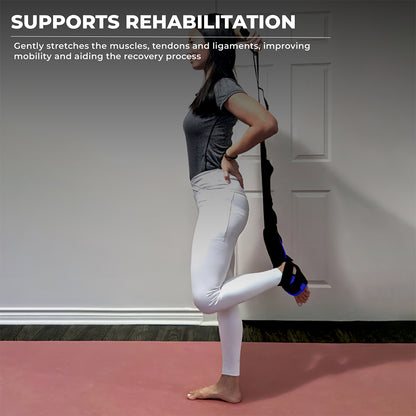 Woman using a foot and calf stretcher with yoga straps, performing a standing stretch to aid rehabilitation and mobility—ideal foot rocker for plantar fasciitis, Achilles tendonitis, and calf muscle recovery using a plantar fasciitis stretch device.