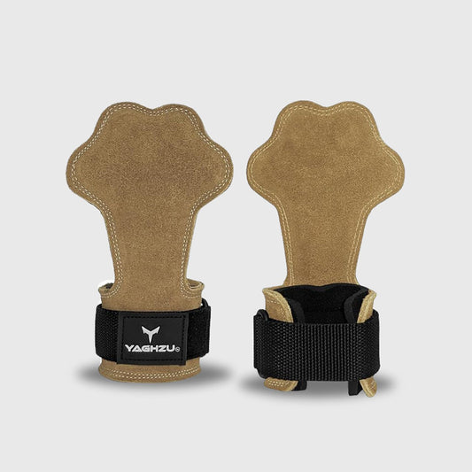 Pair of Tan Yaghzu lifting grips with palm-shaped design and wrist support straps displayed on white background, premium gym grips for weightlifting, pull workouts, and grip enhancement