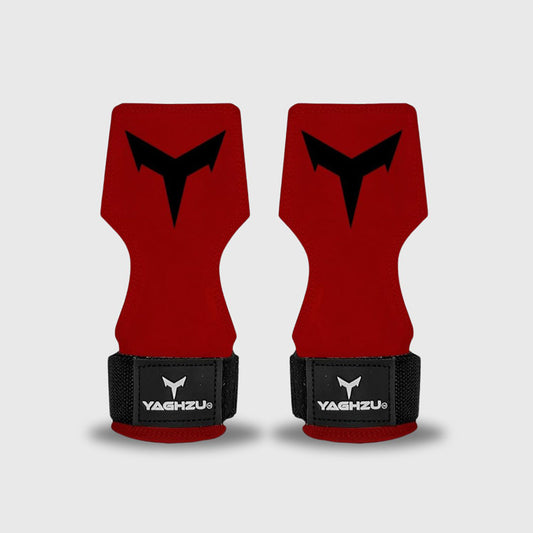 Pair of red Yaghzu lifting grips with black wrist support straps on white background featuring bold V-shaped print, premium gym grips for deadlifts, pull-ups, and weight training support