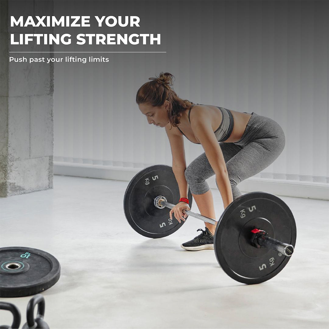 Woman using Yaghzu red weight lifting straps during deadlifts — wrist wraps lifting support, gym straps for grip strength, lifting straps for power training.