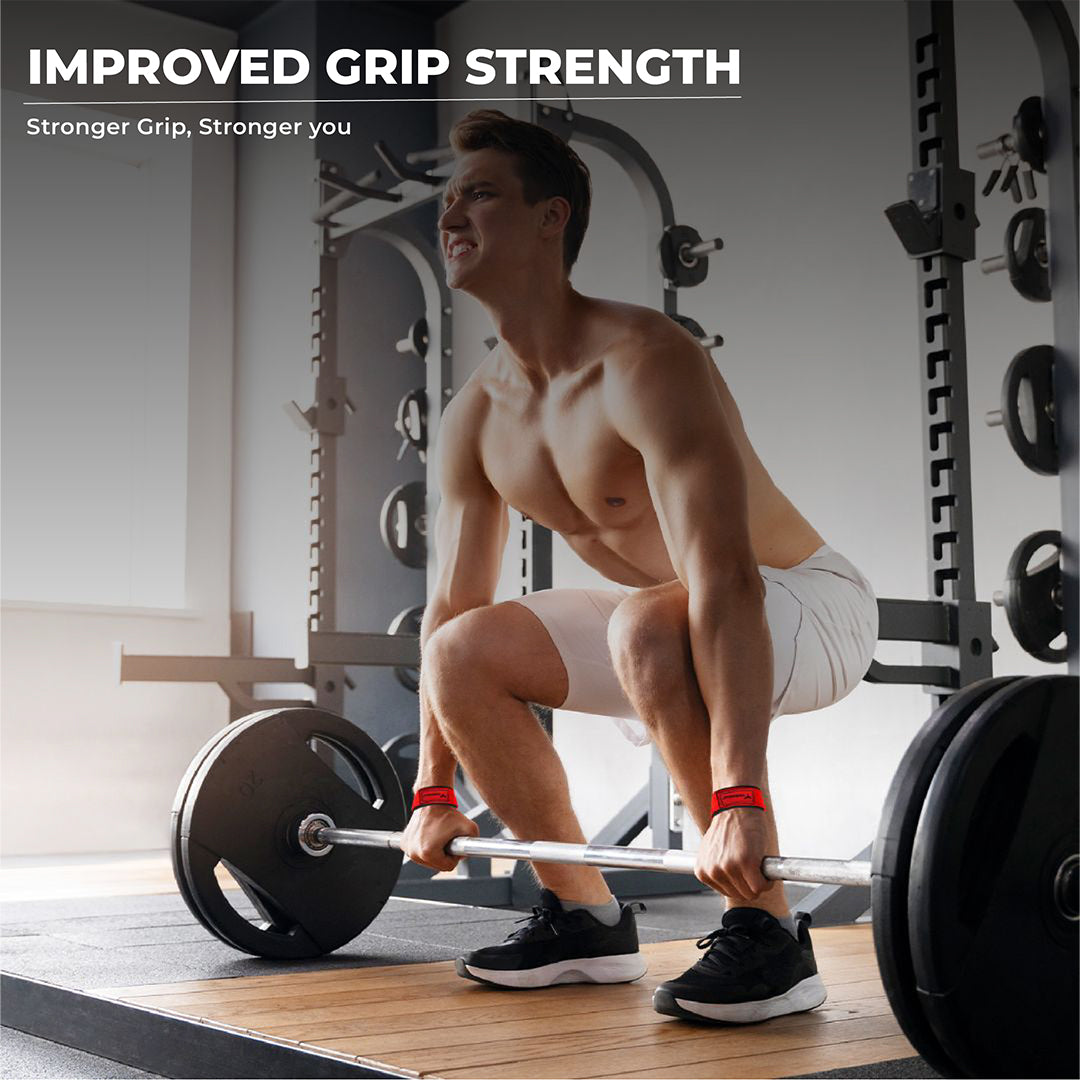Man performing deadlifts using Yaghzu red lifting straps — gym straps for weight lifting, wrist wraps lifting support, deadlift straps for improved grip strength.