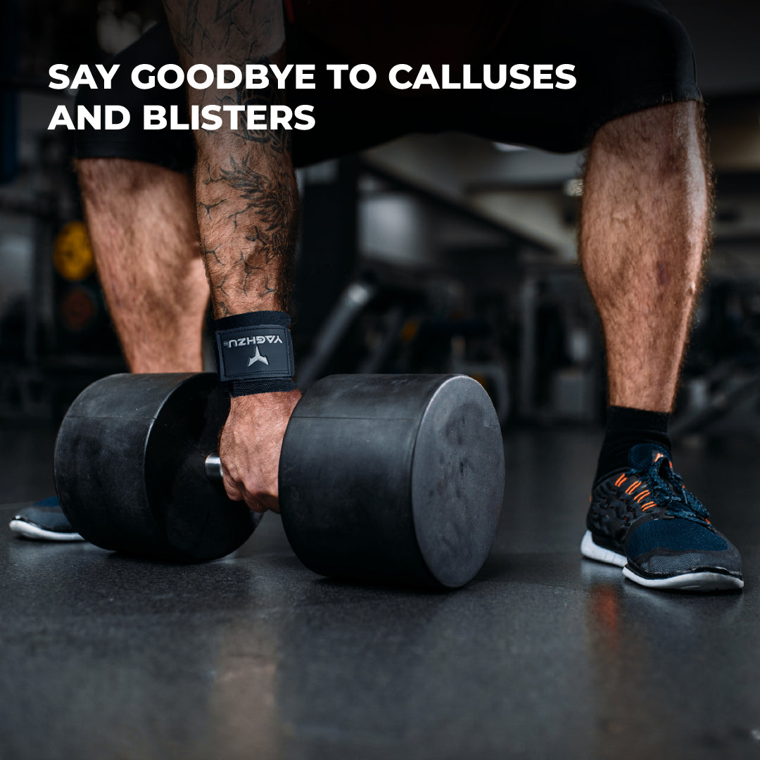 Man gripping heavy dumbbells in a gym while wearing Yaghzu lifting hooks for deadlifts and weight lifting, providing enhanced grip and protection against calluses.