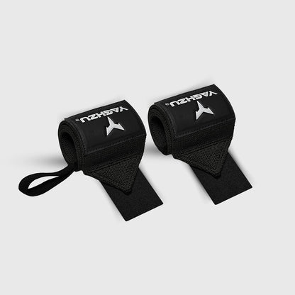 Pair of black Yaghzu wrist wraps with thumb loops, premium support gear for weightlifting, strength training, CrossFit, and powerlifting—ideal for wrist stabilization and injury prevention during heavy lifts