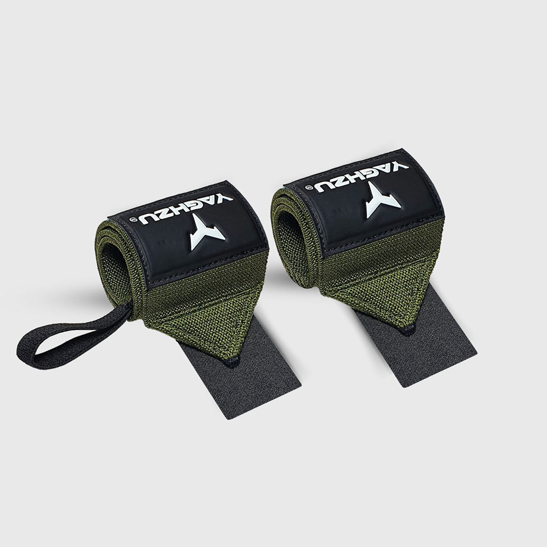 Pair of green Yaghzu wrist wraps with black thumb loops, designed for enhanced wrist support and stability during heavy lifting, displayed on a white background.