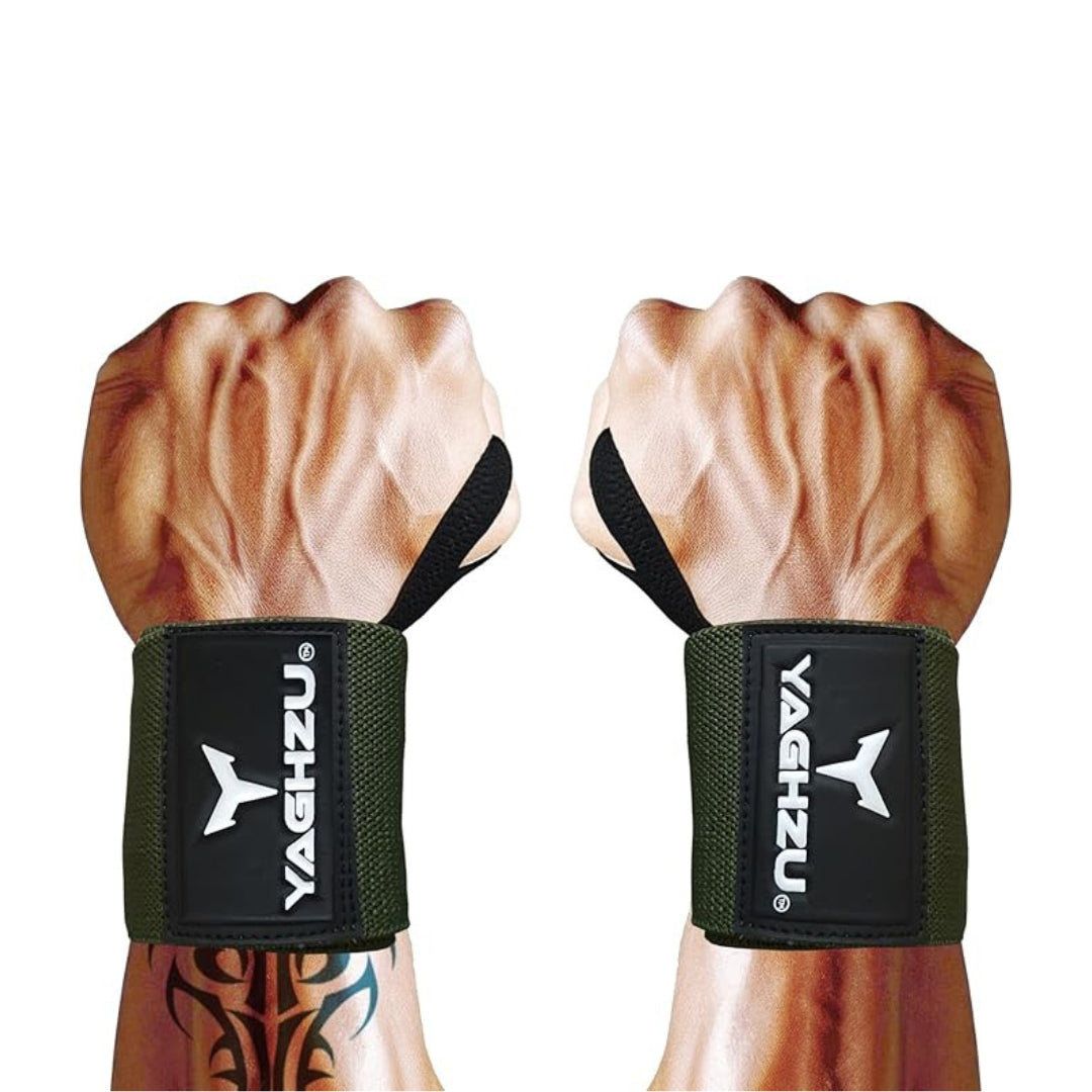 Close-up of muscular arms wearing green Yaghzu wrist wraps with thumb loops, showcasing secure fit and strong wrist support for weight lifting and strength training.