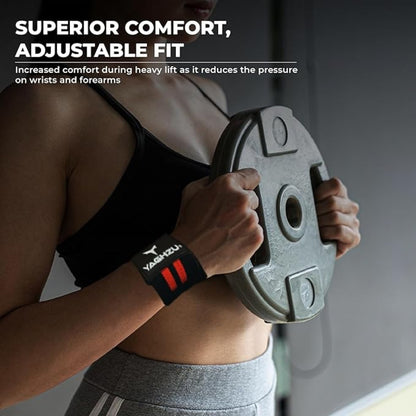 Woman wearing red Yaghzu wrist wraps while holding a weight plate, highlighting superior comfort and adjustable fit for reduced wrist and forearm pressure during heavy lifting workouts