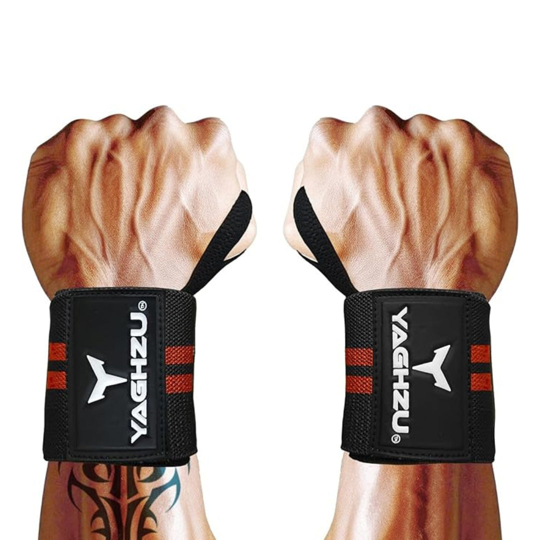 Close-up of muscular arms wearing red Yaghzu wrist wraps with thumb loops, showcasing secure fit and strong wrist support for weight lifting and strength training.